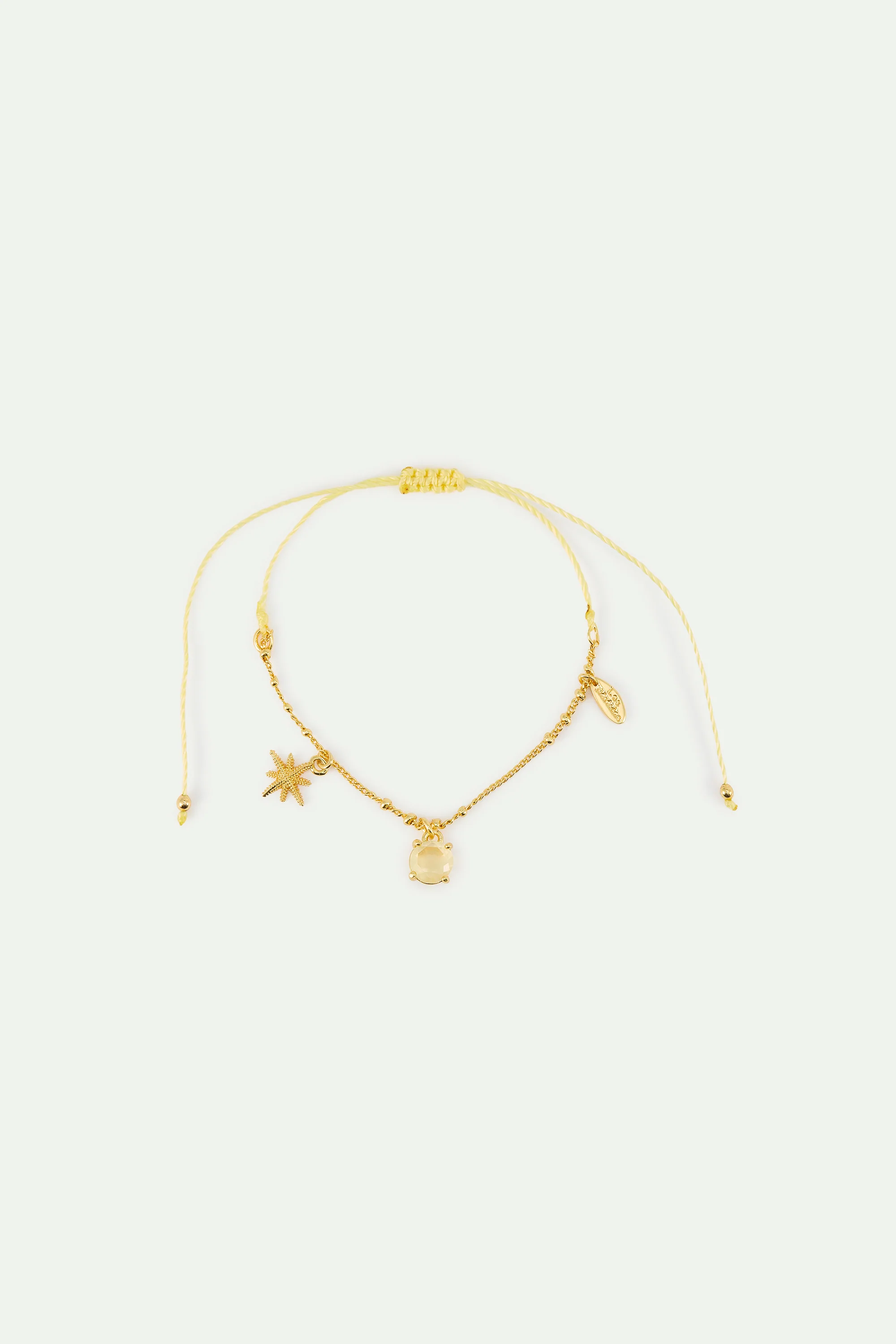 Fine Bracelet with Gold Star and Yellow Stone