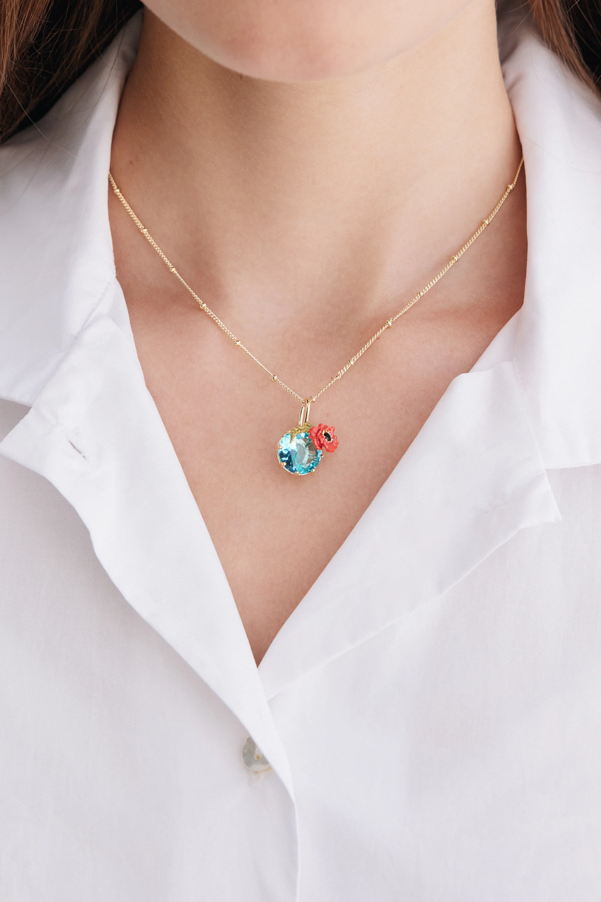 Pendant Necklace with Round Blue Stone and Poppie - Image 4